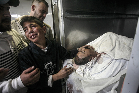 (EDITOR'S NOTE: Image contains death) 
Ahmad Darwish, son of Palestinian Sobhi Darwish (47 years old), cries over his father's body in Rafidia Hospital. Darwish was killed in clashes with the Israeli army forces during a settler attack on the village of Qusra, south of Nablus.