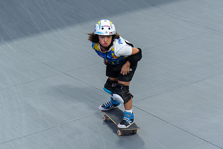 Elizabeth Amador from Philippines competes during the Women's park skateboarding preliminary round in 33rd SEA Games at SAT Extreme Sport Park.