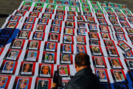 Portraits of women who were victims of gender-based violence are displayed on the ground during the demonstration. A rally takes place in Melbourne to demand immediate and comprehensive action on violence against women and gender diverse individuals. Organisers express concern over the lack of prioritisation of women’s rights by major political parties and criticise the inadequate response to rising rates of gender-based violence. The demonstration aims to honour victims of domestic, family, and sexual violence, while calling for systemic reform and greater government accountability. Participants emphasise that meaningful change should not depend on public petitions to prompt political action. The rally reflects a broader call for justice, safety, and equity.