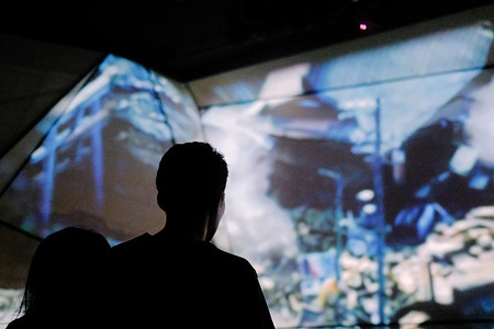 Visitors to the Disaster Reduction and Human Renovation Institution in Kobe, Hyogo Prefecture, view numerous photographs from the time of the Great Hanshin-Awaji Earthquake and the long process of reconstruction.