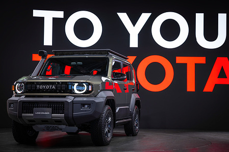 Toyota Land Cruiser on display at Japan Mobility Show 2025. Tokyo's Big Sight pulses with the roar of innovation as the Japan Mobility Show 2025—rebranded heir to the storied Tokyo Motor Show—unfolds from October 30 to November 9, drawing global eyes to Japan's evolving automotive ethos. Amid whispers of an EV slowdown, exhibitors pivot boldly: futuristic compact concepts, expanded luxury lines, and kei-sized electric runabouts nod to market-specific electrification. Manga-inspired booths spotlight refreshed minivans and autonomy-ready compacts, blending whimsy with wired tech. Yet, the narrative diverges from 2023's full-throttle EV fervor. Hybrids and performance icons reassert Japan's "I told you so" on balanced powertrains, tempered by software and sustainability hurdles. Interactive gems abound: mini-mobility careers for tots, kei-truck bazaars hauling regional wares, and a "future tour" immersing visitors in 2035's seamless lifestyles. This biennial bazaar isn't just vehicles; it's a manifesto for "Mobility for All," challenging the world to redefine roads less traveled.
