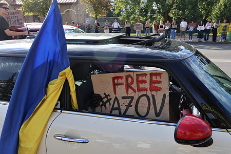 An activists holds a placard that says ‘Free Azov’ near The Embassy of Russia in Kyiv during the rally urging for the return of Ukrainian soldiers of Mariupol garrison from Russian captivity. The "Free Azov" campaign took place near the Russian Embassy in Kyiv. The Free Azov rally in support of the captured defenders of Mariupol regularly takes place in Kyiv and other Ukrainian cities. The activists and relatives of the prisoners of war come out to remind people about the Ukrainian soldiers who have been held in Russian captivity for more than two years.