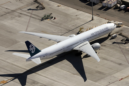 An Air New Zealand Boeing 777-300ER parked at Los Angeles International Airport.