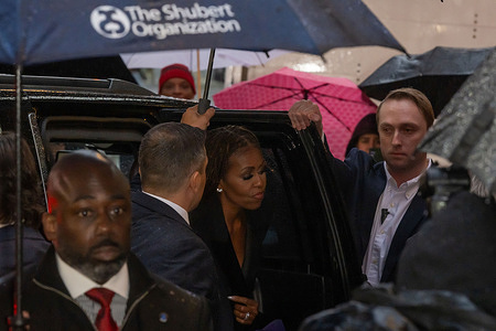 Michelle Obama arrives for "Joe Turner's Come and Gone" Broadway Revival Opening Night at Barrymore Theatre in New York City.