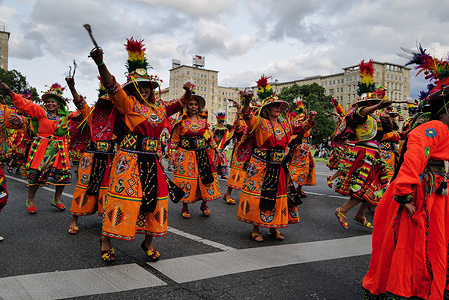 A group of participants performs during the carnival. This year's Karneval der Kulturen has taken place in Berlin as thousands lined on the streets to view the many groups performing along Frankfurter Allee.