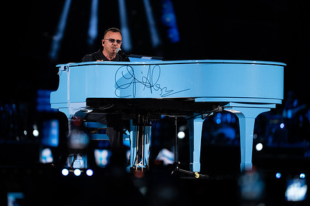 Gigi D'Alessio performs live on stage at Maradona Stadium.