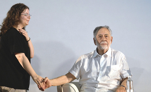 Legendary movie director Francis Ford Coppola seen with a theatre student during the Magna Graecia Film Festival at Supercinema with the talk "How To Change Our Future”.