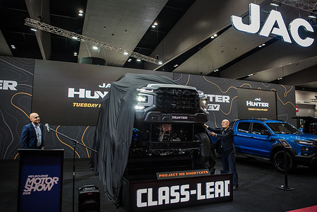 Ahmed Mahmoud , managing director LTS Auto and Xiang Xingchu, the chairman of JAC Group seen unveiling 2026 JAC Hunter PHEV production model during media launch at the 2026 Melbourne Motor Show.