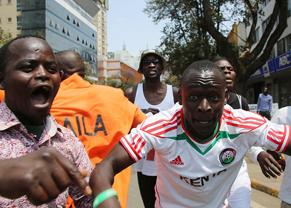 The National Super Alliance (NASA) supporters are seen dancing and shouting slogan during a demonstration against Independent Electoral Boundaries commission (IEBC) calling for the removal of its officials.
Police used tear gas to disperse demonstrators after they protested against election officials, asking them to be sacked before the new presidential vote, because they are in favor with the actual Kenyan President Uhuru Kenyatta.