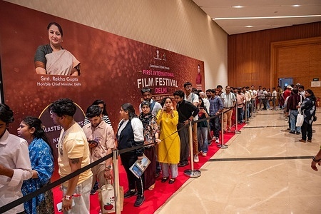 A long entry queue can be seen outside the film screening auditorium during the International Film Festival Delhi (IFFD) 2026 is a global cinema event being held at Bharat Mandapam in New Delhi. The festival is taking place from 25 March to 31 March 2026 and is being organized by the Delhi Tourism & Transport Development Corporation (DTTDC), Government of Delhi.