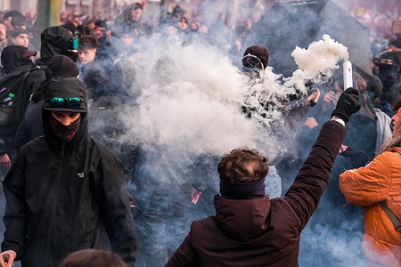 Anarchist activists from various parts of Italy and from abroad, take part in a nationwide mobilization in the center of Turin. The protest targets the Italian government's policies, ongoing armed conflicts, and actions against self-managed social spaces. The demonstration forms part of a cycle of initiatives that emerged following the eviction of the Askatasuna social center in December 2025, an event that has consolidated Turin’s role as a reference point for anarchist, antifascist, and radical left movements.