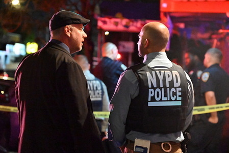 NYPD crime scene unit investigators and detectives work at the scene of stabbing at 3322 Third Avenue. Monday evening at approximately 10:34 PM, a 31-year-old male was stabbed to the chest, transported by ems to NYC Health and Hospitals / Lincoln where he was pronounced dead. There are no arrests and the investigation is ongoing. The identity of the deceased is being withheld pending proper family notification.