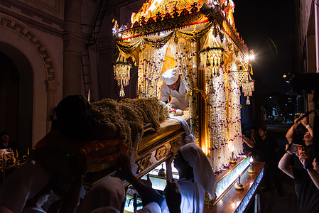 Thai Christians prepare a statue of Jesus Christ for marching during Good Friday celebration at the Immaculate Conception Church. Thai Christians celebrating the Good Friday as the part of the Holy week to commemorate the passion and crucifixion of Jesus Christ at the Immaculate Conception Church.