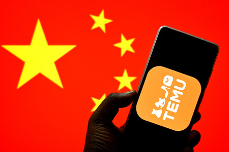 In this photo illustration, a Temu logo is seen displayed on a smartphone with a Chinese flag in the background.