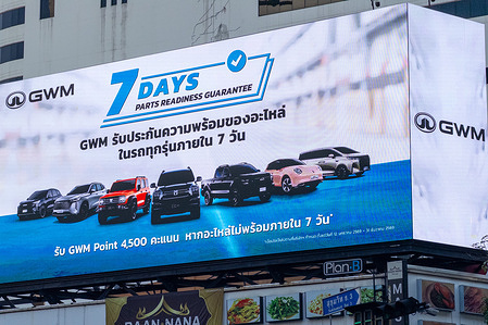 Ahead of the Bangkok International Motor Show 2026, an advertising LED billboard displays car promotions of a Chinese car brand, Great Wall Motors, a.k.a. GWM, on Sukhumvit Road.
