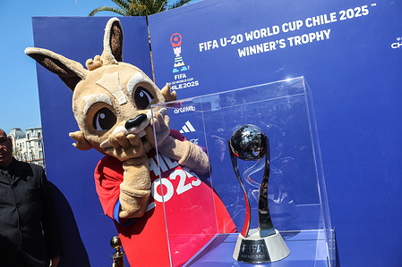 Vito, the official mascot of the U-20 World Cup seen next to the trophy. The exhibition of the U-20 World Cup trophy.