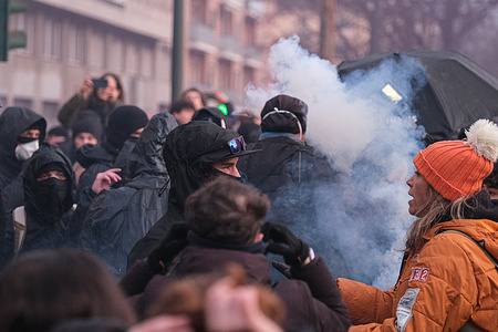 Protesters take part in a national demonstration involving anarchist groups and activists from the antagonistic movement who have travelled from various regions of Italy and from abroad. Protesters rally against the policies of the Italian government, international conflicts, and measures targeting self-managed social spaces. The demonstration takes place amid a broader wave of mobilization following the eviction of the Askatasuna social center in December 2025, which has established Turin as a key reference point for anarchist, antifascist, and radical left movements.