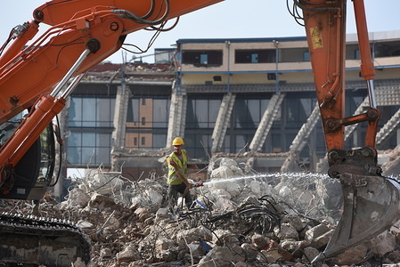 A worker sprays water with a hose as demolition continues at the Vicente Calderon in Atletico de Madrid old stadium.
Vicente Calderon stadium was named after the club’s former president and it was opened in October 1966 in the south of the city, on the Manzanares River. It has hosted the Atletico de Madrid’s matches for over 50 years, until their move to the Wanda Metropolitano in 2017.