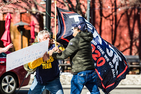 Protestors are seen arguing during the demonstration.Protesters gathered at the state's legislative building to protest various causes such as the Biden inauguration, Covid-19 restriction, vaccine, religious ideas, Qanon, common core education, without a cohesive message, during the first day of the 81st (2021) Session of the Nevada Legislature.