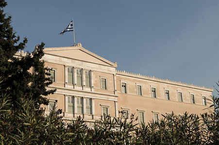 The Greek parliament in Athens. In front of the parliament is the monument for the unknown soldier where the Changing Of The Guard ceremony takes place.
