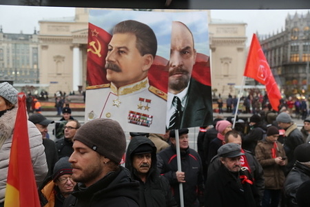 The portrait of Vladimir Lenin and Joseph Stalin seen during the march.
Thousands marched to Revolution Square in central Moscow to commemorate the 100th anniversary of the Russian Revolution. Many carried portraits of Lenin, Stalin, and flags with the emblem of the Soviet Union. The march also included people from several countries including China, Italy, Venezuela, Brazil, and Cuba.