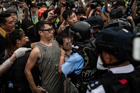 Protesters clash with riot police agents during the demonstration.
People gathered for another day of protests against the extradition law in the Sha Tin district of Hong Kong with a growing list of grievances, maintaining pressure on Chief Executive Carrie Lam.
