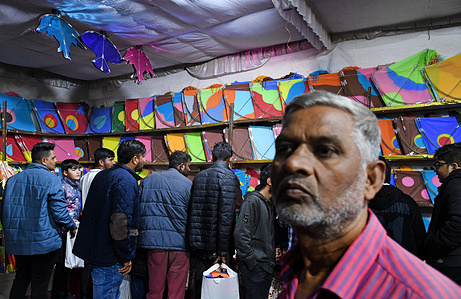 People are seen shopping for kites on the eve of Makar Sankranti festival. Makar Sankranti, also called Uttarayana or Sankranti, is a Hindu festival on January 14 (or January 15 in a leap year), marking the sun's shift from Sagittarius to Capricorn. It is celebrated across India with colorful decorations, door-to-door singing by children, meals, dances, kite flying, bonfires, and feasts, the festival brings people of all ages together on their terraces.