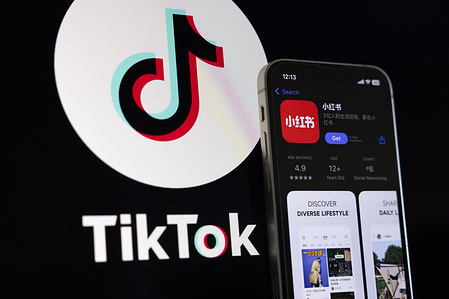 In this photo illustration, TikTok alternative app "RedNote" which is also called the Chinese Instagram is seen displayed on a mobile phone. A potential TikTok ban in the USA makes many TikTok users migrate to "Chinese Instagram" social media application RedNote also known as Xiaohongshu or Little Red Book (Red). The RedNote app supports short-form content and is also used as an e-commerce platform.
