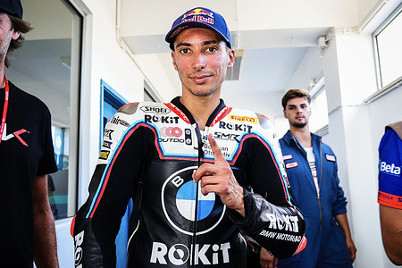 Toprak Razgatlıoğlu of Turkey from the ROKiT BMW Motorrad WorldSBK Team poses for a photo on the second day of the 2025 World Superbike Estoril Round at Circuito do Estoril.