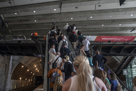 Crowds of tourists in the Monaco metro station. Monaco City is one of the four traditional quartiers (districts) of Monaco
