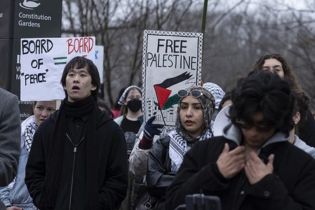 Anti-Trump and pro-Palestinian demonstrators gather outside the Donald J. Trump Institute of Peace, as U.S. President Donald Trump holds the inaugural meeting of the Board of Peace. The board, formally established on the sidelines of the World Economic Forum in January 2026, aims to raise funds for the rebuilding and stabilization of Gaza.