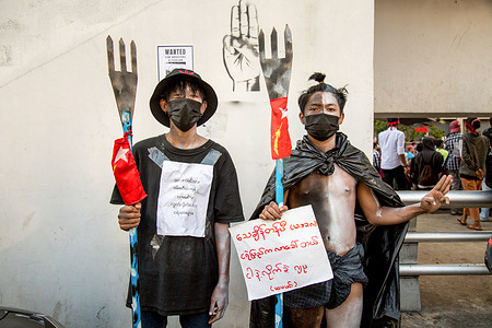 Protesters dressed in costumes and holding signs raise three finger salutes during the 5th day Military Coup demonstrations.
Thousands of people took to the streets of Yangon on the fifth day of protest against the military coup and demanded the release of Aung San Suu Kyi. Myanmar's military detained State Counsellor of Myanmar Aung San Suu Kyi on February 01, 2021 and declared a state of emergency while seizing the power in the country for a year after losing the election against the National League for Democracy (NLD).