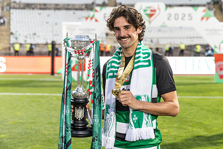 Francisco Trincao of Sporting CP celebrates with the trophy during the Portuguese Cup 2024/2025 - Final match between SL Benfica and Sporting CP at Estadio Nacional. (Final score: SL Benfica 1 - 3 Sporting CP)