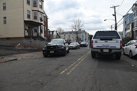 Authorities investigate ballistic evidence found following a fatal shooting. Investigation continues into a fatal shooting in Newark . Authorities came back to Ridgewood Avenue and West Bigelow Street in Newark, New Jersey to investigate ballistic evidence at 144 Ridgewood Avenue following a fatal shooting of an unidentified man who suffered from multiple gunshot wounds, Wednesday evening, January 3, 2024. Residents gave a look inside of their home where they attempted to save the man who was severely wounded. Residents took the wounded man inside to 147 Ridgewood Avenue and attempted to save his life, but ultimately, the unidentified male succumbed to his gunshot wound injuries.