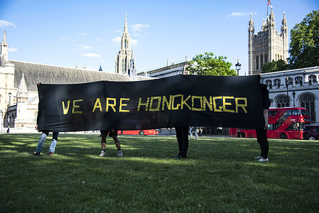 Activists hold a large banner saying, we are Hong Konger, during the demonstration and commemoration.
The Justitia Hong Kong commemorate the “612” Second anniversary in Parliament Square which saw the Hong Kong Government introduce the Fugitive Offenders amendment bill to the Legislative Council for a second reading despite mass opposition.