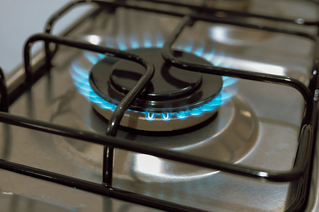 In this photo illustration, the flame of a working gas stove seen displayed.