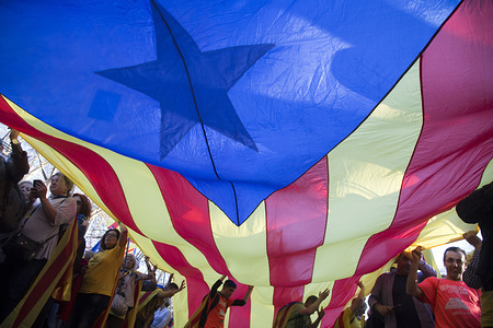 Demonstrators seen with a huge Catalan flag during the protest.
Hundreds of Catalans protest in Madrid for independence, for self-determination and for the freedom of the political prisoners.