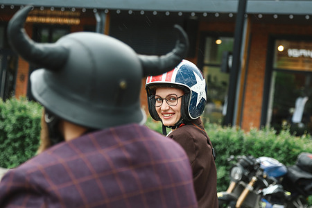 Participants wearing strict dress code and helmets during Distinguished Gentleman’s Ride in central Moscow. The Distinguished Gentleman’s Ride unites classic and vintage styled motorcycle riders from all over the world to raise funds and awareness for prostate cancer research and men’s mental health. Rules of events includes classic or retro motorcycles, dress code with classic suit and dresses, respect and courtesy on the road