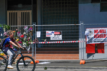 A cyclist is seen passing by the Adass Israel Synagogue in Ripponlea suburb of Melbourne in the wake of the firebomb attack. A fire that tore through a Melbourne synagogue in the early hours of Friday has led to an ongoing police search and an outpouring of condemnation from politicians, ambassadors, and multicultural community representatives. Around 60 firefighters and 17 trucks were called to the Adass Israel synagogue at Ripponlea in Melbourne's south shortly after 4 am on Friday after a large blaze engulfed the building. The fire, which police say was deliberately lit, was brought under control just before 5 am. Victorian Police have launched an investigation but are yet to make any arrests. Federal and state political leaders, as have community figures and heads of multicultural organizations, have condemned the incident.