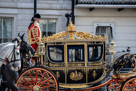 King Charles III makes his way by state coach to the Palace of Westminster to deliver the King’s Speech at the State Opening of Parliament. Anti-royalist activists lined the route, holding placards that state “DID YOU KNOW” in reference to Andrew Mountbatten-Windsor’s relationship with child sex offender Jeffrey Epstein.
