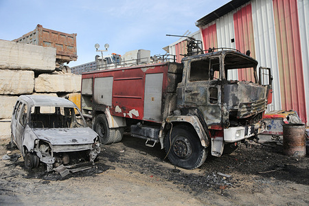 A fire truck and a Palestinian vehicle seen burnout after being set ablaze by Jewish settlers during an attack on the village of Aref, south of Nablus in the West Bank. Local residents reported damage to their vehicles, trucks, and bulldozers. Three Palestinians were injured, according to the Palestinian Red Crescent, and were taken to a hospital in Nablus.