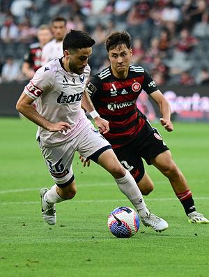 Stefan Nigro (L) of Melbourne Victory FC and Aidan Simmons (R) of Western Sydney Wanderers FC are seen in action during the A-League 2023/24 season round 7 match between Western Sydney Wanderers FC and Melbourne Victory FC held at the CommBank Stadium. Final score; Melbourne Victory 4:3 Western Sydney Wanderers.