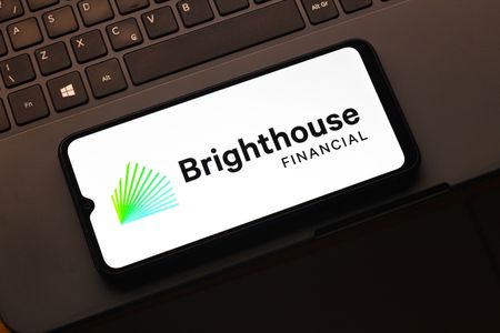 In this photo illustration, the Brighthouse Financial logo is seen displayed on a smartphone screen.