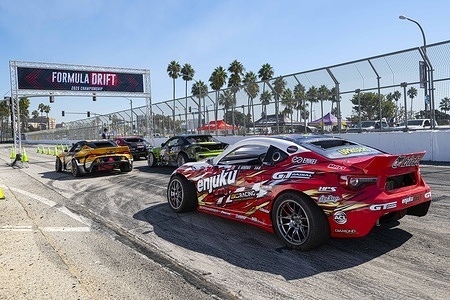 (R-L) Hiroya Minowa, Frederic Aasbo, Ryan Litteral and Jeff Jones seen at the staging line before warmups. Formula drift closes out the 2025 drift season on the streets with a new road course after the inevitable closing of Irwindale speedway. Jack Shannahan was able to come out on top of competition for the event and James Deane driver was able to secure first place overall making him the 2025 formula drift champion.