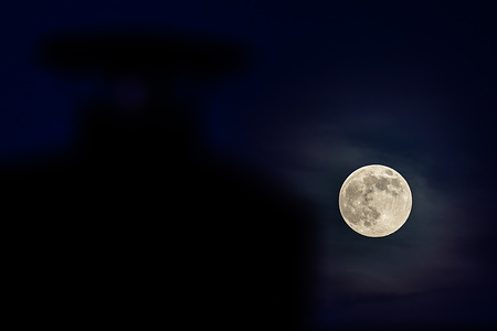 Full moon appears in the sky in Sintra.