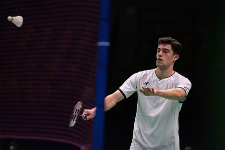 Julien Carraggi of Belgium plays against Riku Hatano of Japan during the Badminton Men's single match in the Princess Sirivannanari Thailand Masters 2023 at Nimibutr Stadium. Riku Hatano won over Julien Carraggi 2:0 (21:13, 21:11).