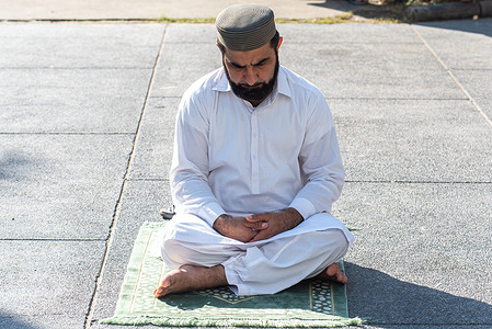 A Muslim performs Eid al-Adha prayer at the Islamic center of Thailand. Eid al-Adha is the second of the two main festivals in Islam alongside Eid al-Fitr. It falls on the 10th of Dhu al-Hijja, the twelfth and final month of the Islamic calendar.