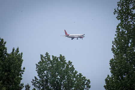 An Indian passenger aircraft prepares to land at Srinagar International Airport in Indian-administered Kashmir marking the first civilian flight since a ceasefire was brokered by U.S. President Donald Trump. The truce which took effect on Saturday followed four days of the heaviest fighting in nearly 3 decades with missiles and drones striking military installations and leaving more than 60 dead on both sides.