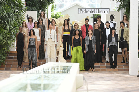 A model parades with Pedro del Hierro design during the Mercedes Benz Fashion Week Madrid at Cibeles Palace in Madrid.