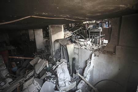 View of a damaged building damaged during a military operation inside the Balata refugee camp in the West Bank city. The Israeli army launched a widespread arrest campaign, raided homes, and ransacked their contents. They also arrested a number of Palestinians during the operation, evacuated homes and converted them into military barracks.